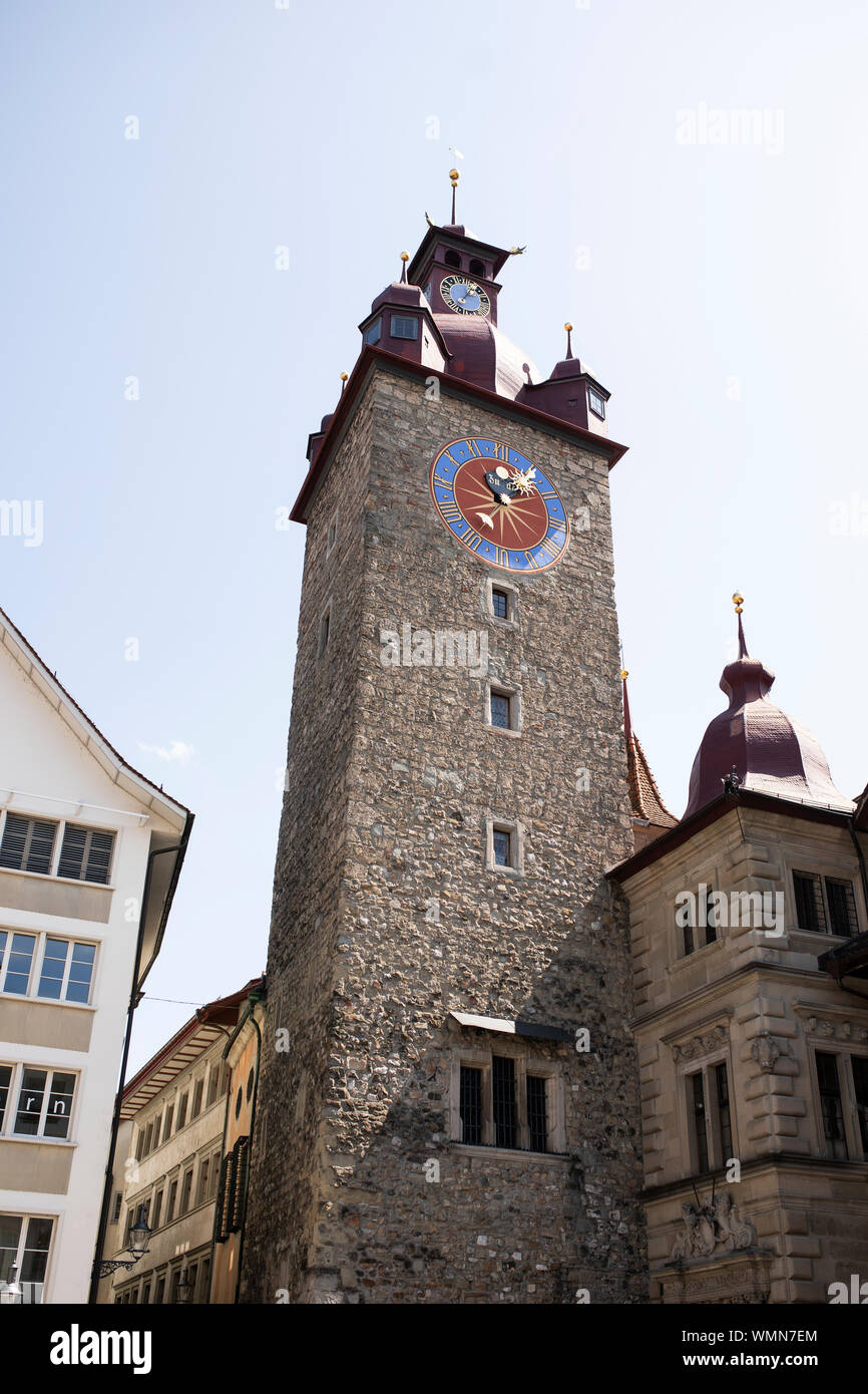 The clock tower of the historic town hall on Kornmarkt in Lucerne, Switzerland. Stock Photo
