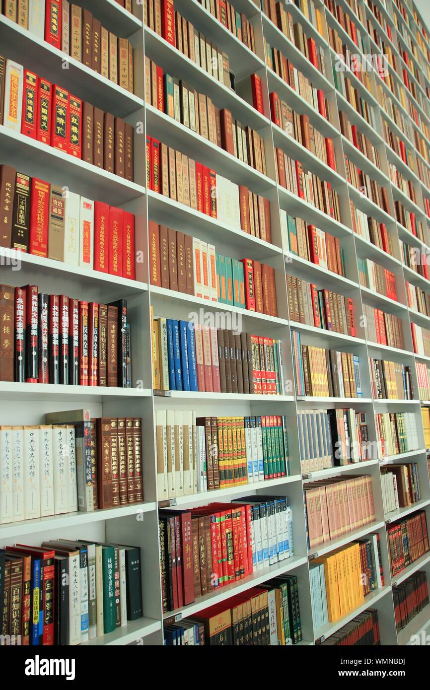 Books arranged in shelf hires stock photography and images Alamy