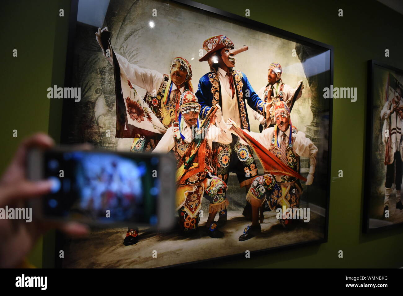 Lima, Peru. 4th Sep, 2019. A Portrait of villagers dressed in traditional  costumes at the Mate museum during the exhibition in Lima.Mario Testino  exhibition ''Alta Moda'' is the result of a five-year