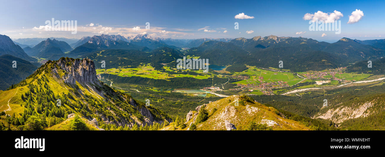 aerial view to mountain Zugspitze and city Garmisch-Partenkirchen in Bavaria, Germany Stock Photo