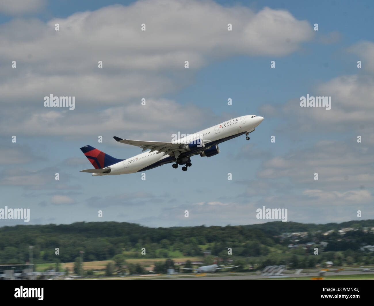 Delta Airlines plane landing at zurich airport Stock Photo Alamy