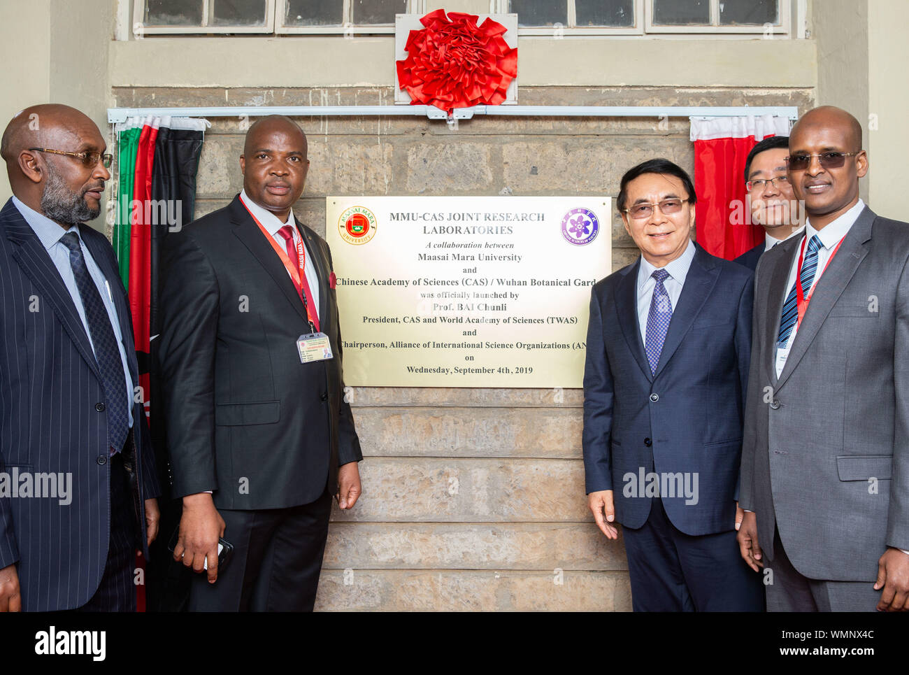 Nairobi, Kenya. 4th Sep, 2019. Bai Chunli (3rd R), president of the Chinese Academy of Sciences (CAS), and Bulitia Godrick (2nd L), deputy vice-chancellor in charge of academic and student affairs at Maasai Mara University (MMU), attend an unveiling ceremony of the MMU-CAS Joint Research Laboratories at MMU, about 145 kilometers southeast of the capital Nairobi, Kenya, on Sept. 4, 2019. Credit: Lyu Shuai/Xinhua/Alamy Live News Stock Photo