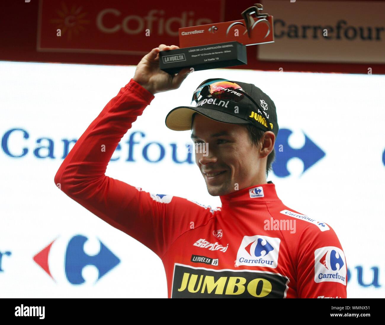 Bilbao, Spain. 05th Sep, 2019. Slovenian rider Primoz Roglic of Team  Jumbo-Visma celebrates on the podium with the overall leader's red jersey  after the 12th stage of the Vuelta a Espana cycling