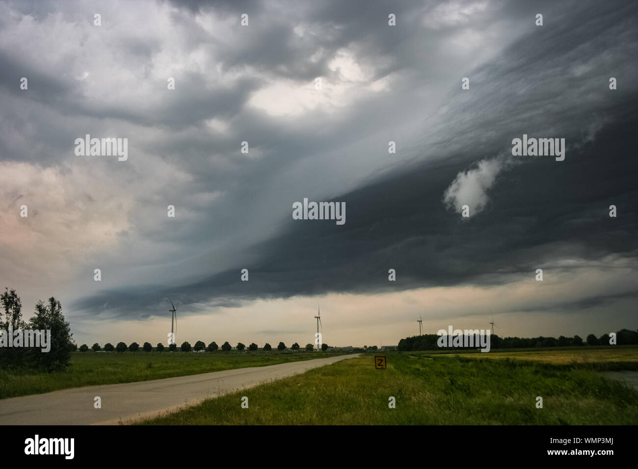 Shelfcloud of a storm front moves across the countryside in The Netherlands Stock Photo