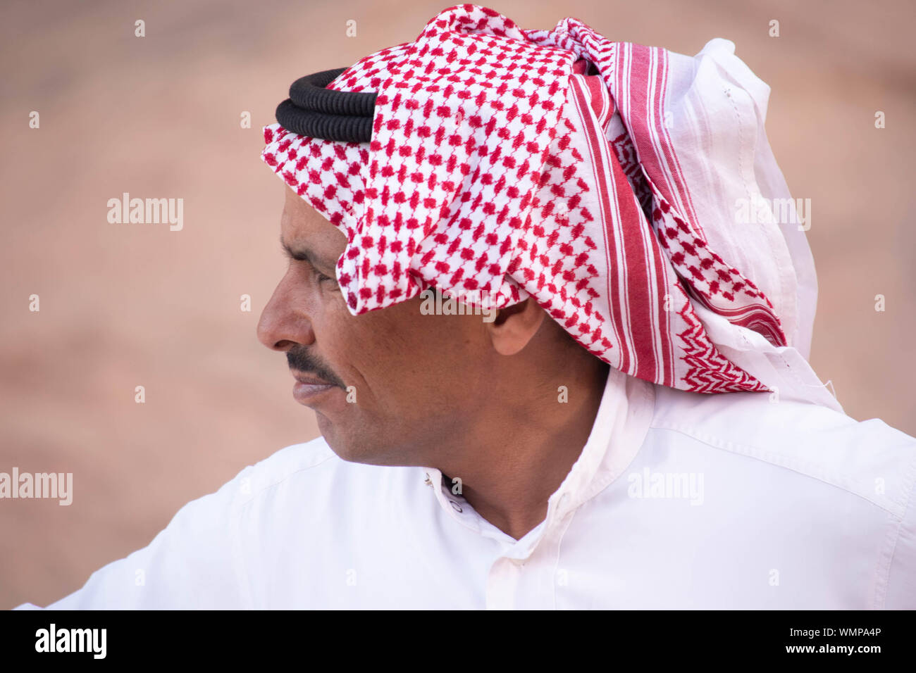 Bedouin wearing traditional Hashemite scarf with agal (igal or egal