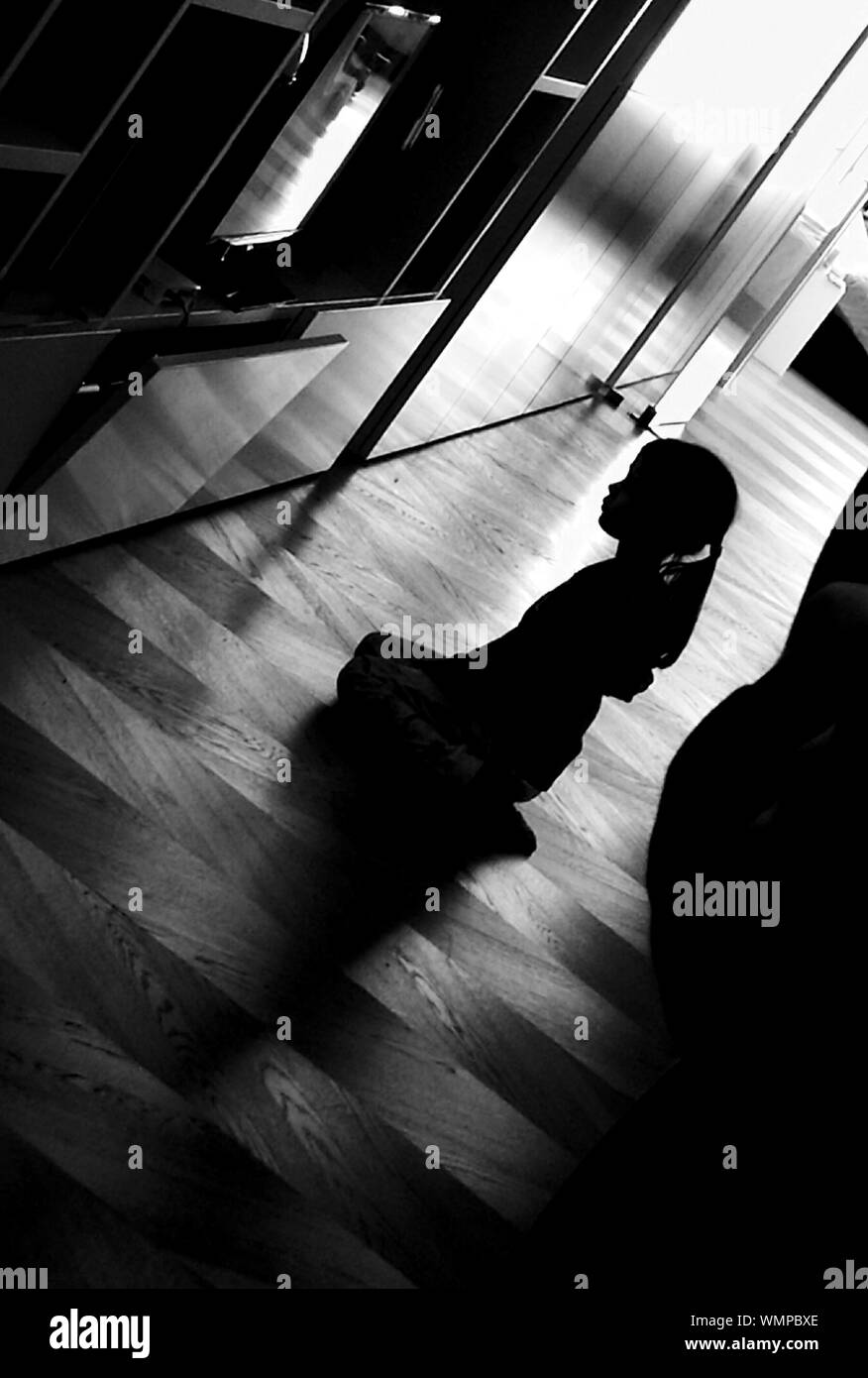 Kneeling On Floor High Resolution Stock Photography and Images - Alamy
