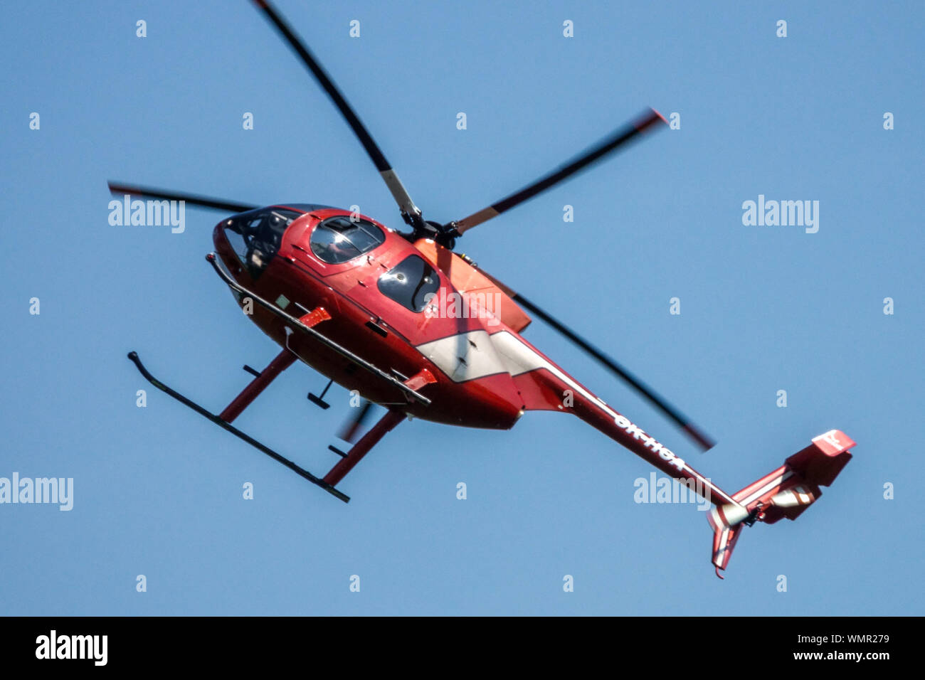 Helicopter MD 500 E in flight Stock Photo