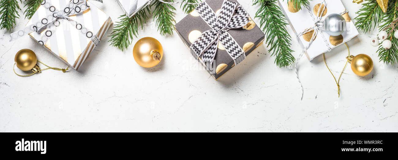 Christmas background with Gold present box and decorations Stock Photo