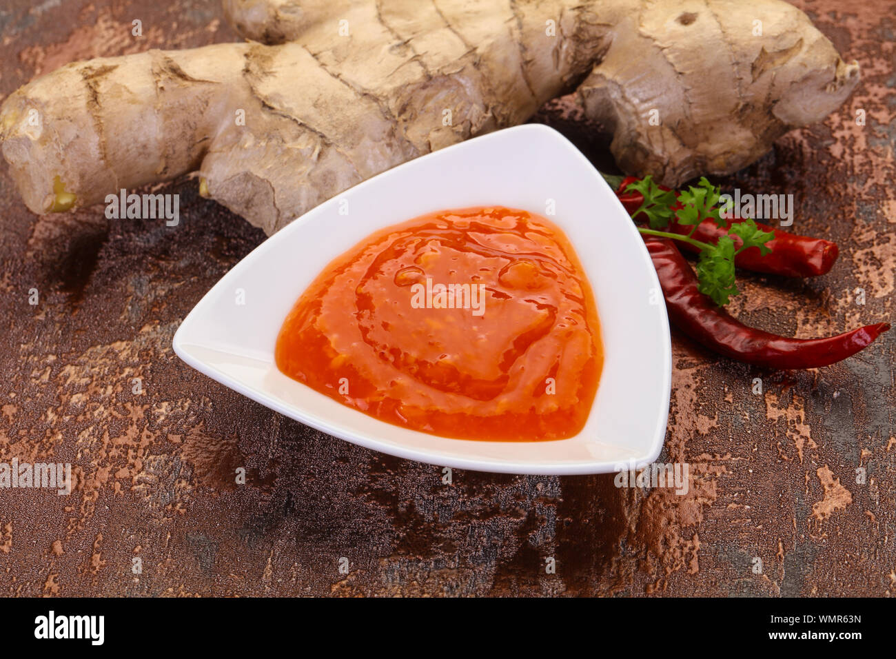 Ginger chili sauce with root and pepper Stock Photo - Alamy