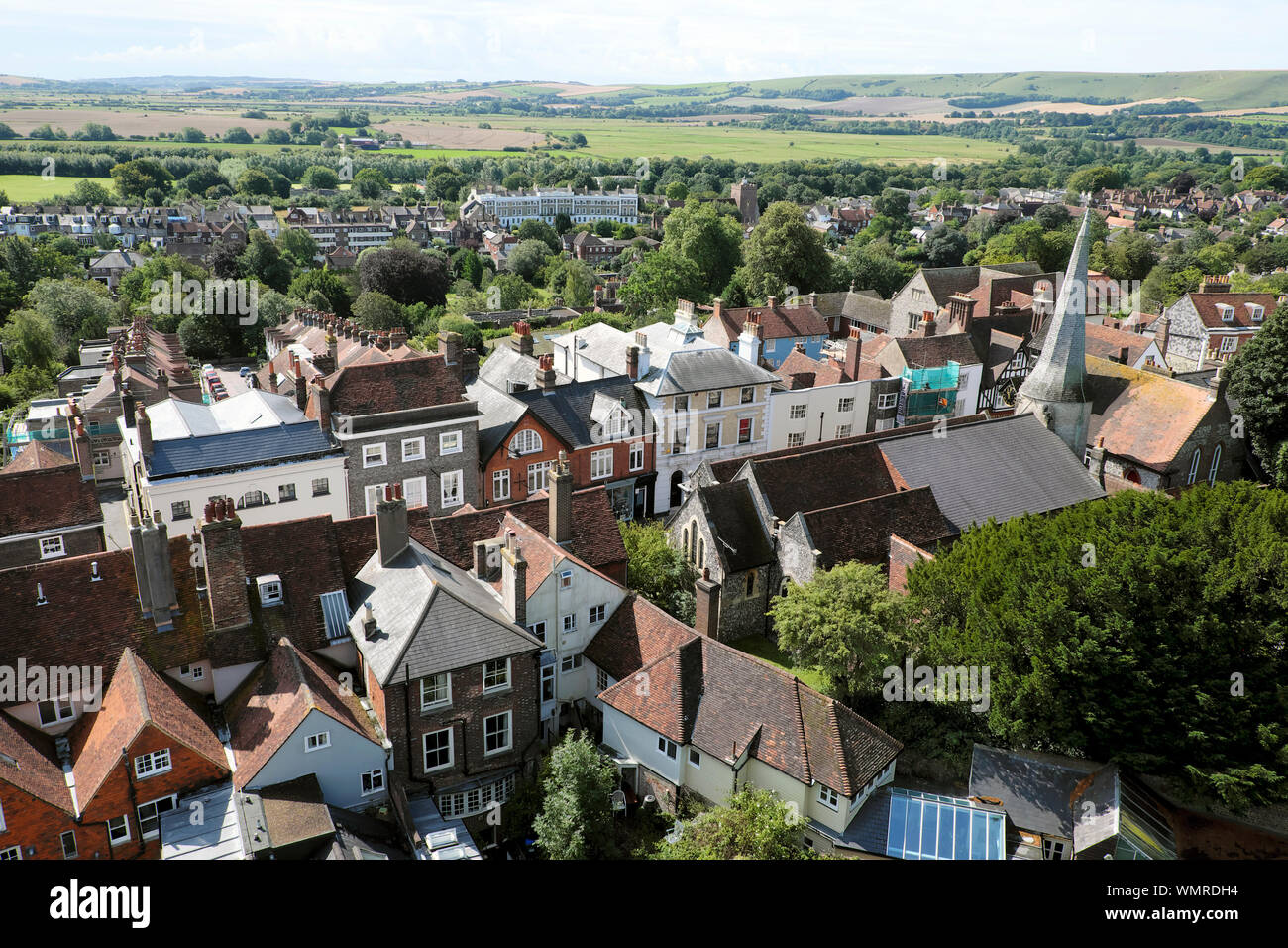 View of Lewes town, church spire, houses, rooftops and countryside landscape from Lewes Castle South Tower in East Sussex England UK  KATHY DEWITT Stock Photo