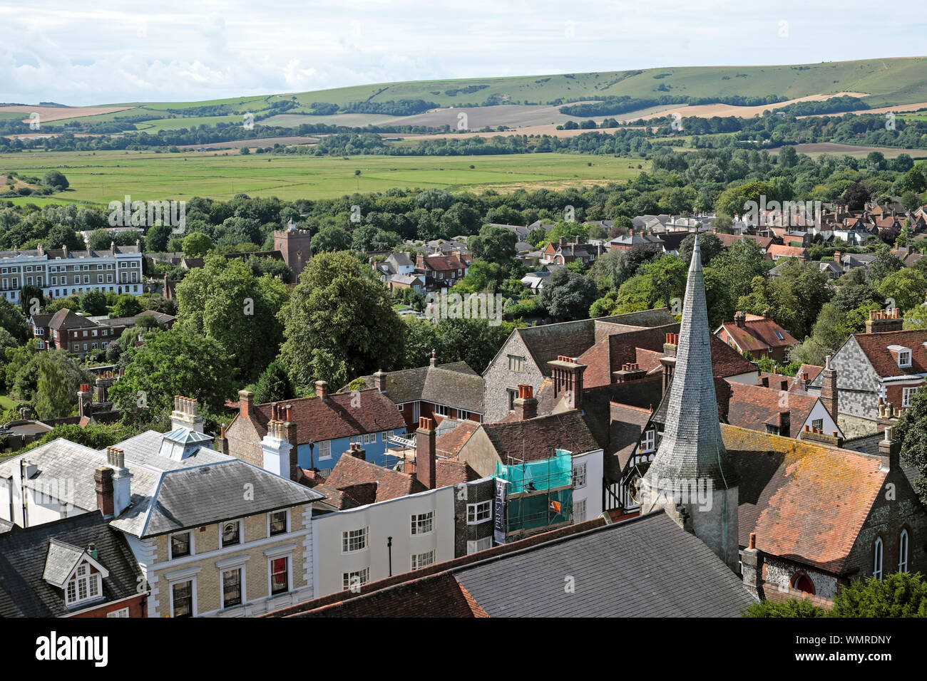 View of Lewes town, church spire, houses, rooftops and countryside landscape from Lewes Castle South Tower in Sussex England UK  KATHY DEWITT Stock Photo