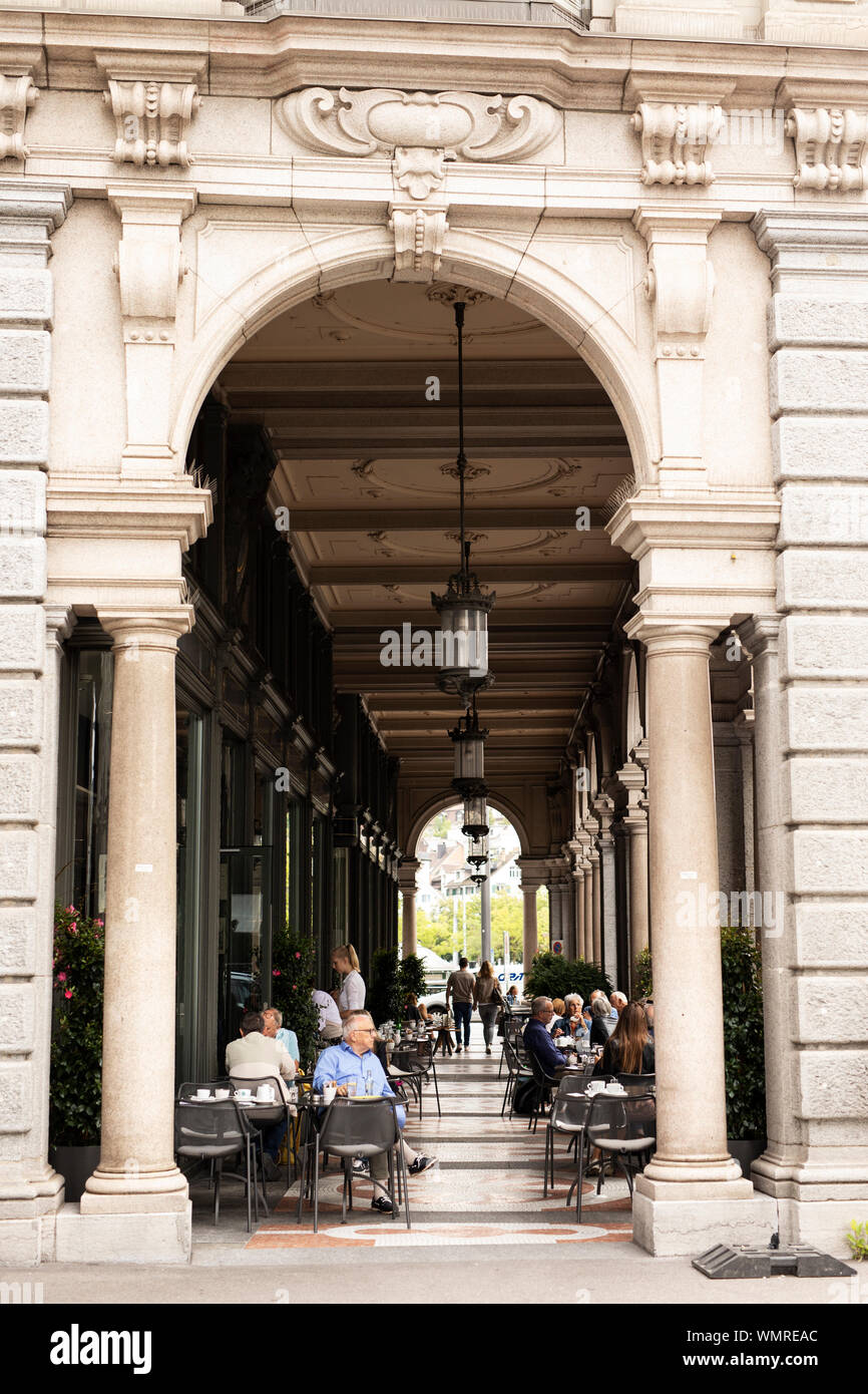 A covered shopping passage with outdoor cafe dining in the city of Zurich, Switzerland. Stock Photo