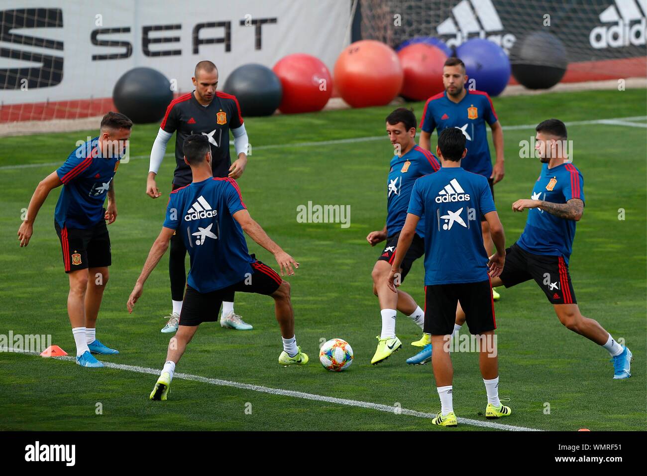 How does Spain's system compare to Uruguay's?