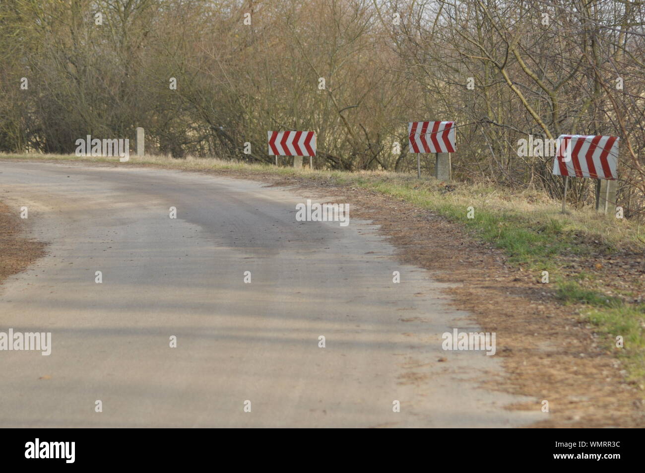 Road Signs The Sign Of The Bend Winding Road Stock Photo