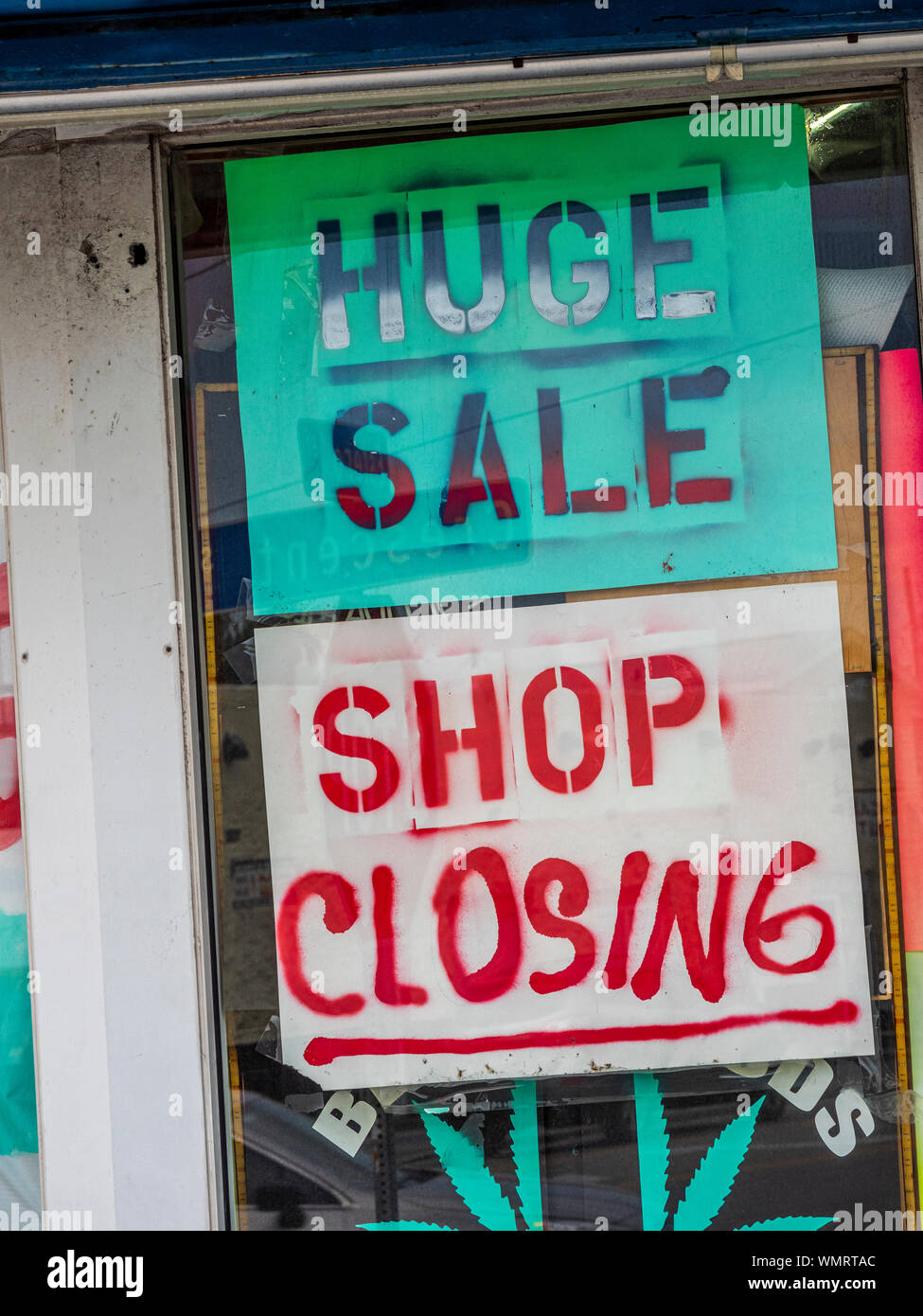 Sale sign in store window Stock Photo