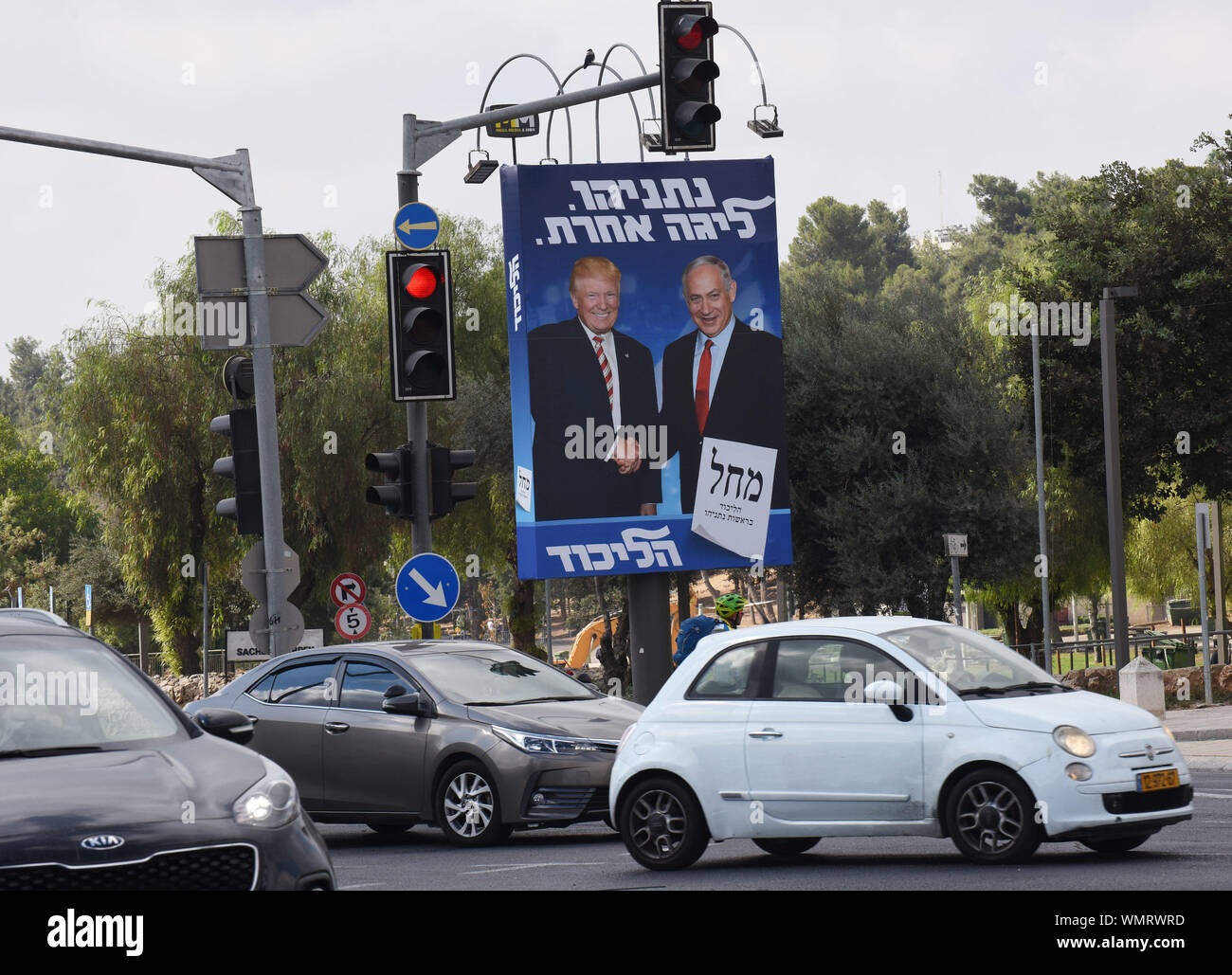 Jerusalem, Israel. 5th Sep 2019. Cars pass a large election campaign poster with a photo of U.S. President Donald Trump shaking hands with Israeli Prime Minister Benjamin Netanyahu in Jerusalem, Thursday, September 5, 2019. The poster reads in Hebrew 'Netanyahu Is In A League Of His Own.' Israelis return to the polls on September 17, for the second national election in 2019.  Photo by Debbie Hill/UPI Credit: UPI/Alamy Live News Stock Photo