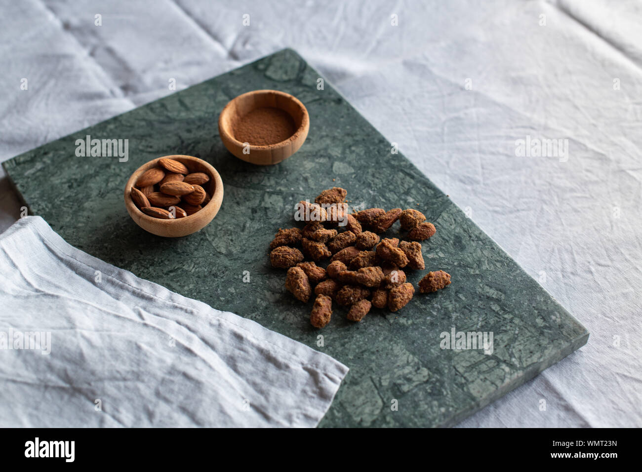 baked garlic with cinnamon, healthy vegan snacks Stock Photo Alamy