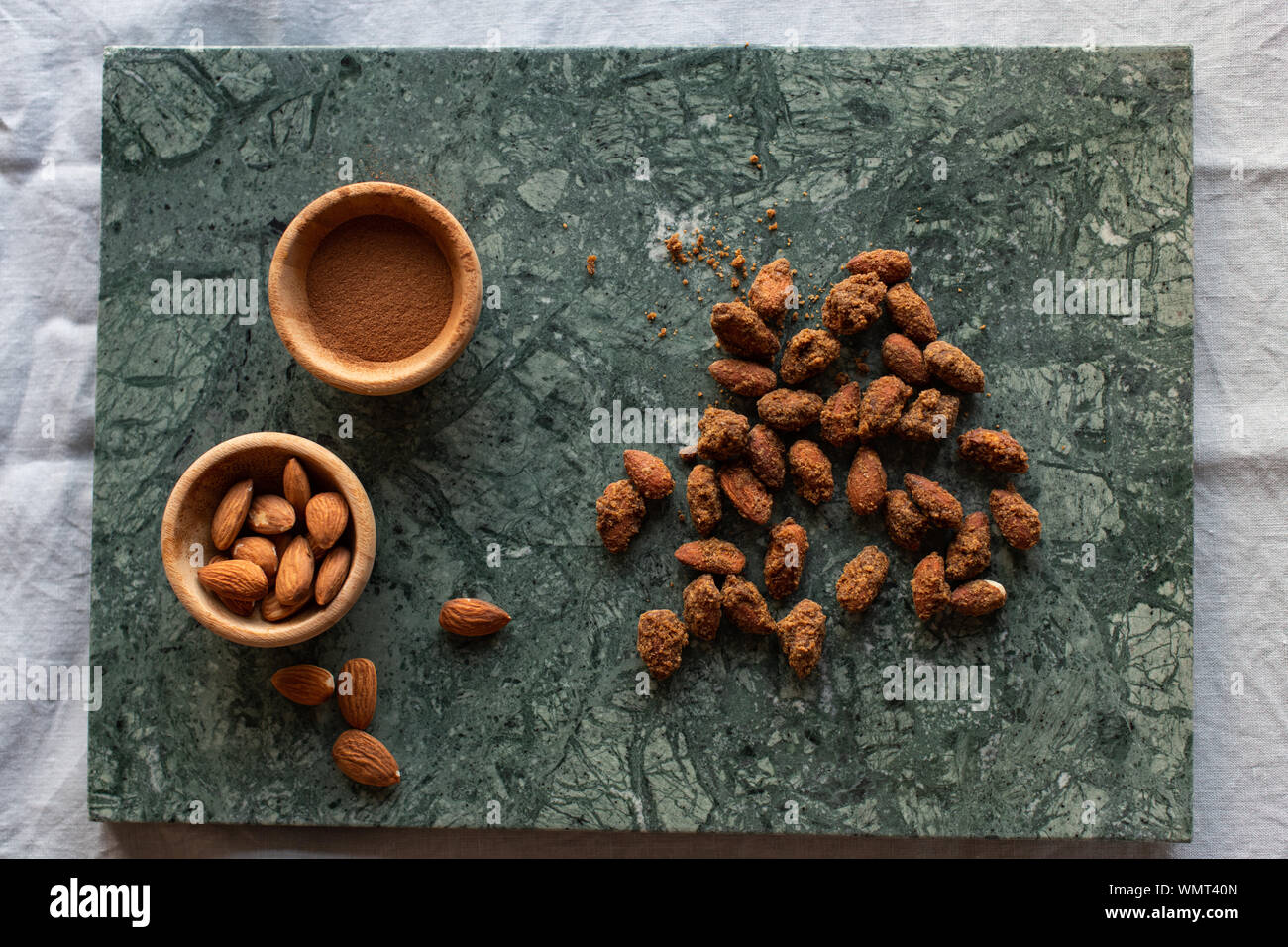 baked garlic with cinnamon, healthy vegan snacks Stock Photo Alamy