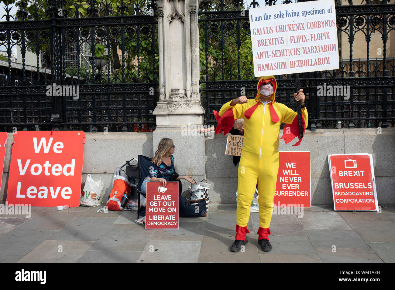 Pro Brexit protester dressed up as a chicken in a satire on Jeremy Corbyn in Westminster on the day after Parliament voted to take control of Parliamentary proceedings and prior to a vote on a bill to prevent the UK leaving the EU without a deal at the end of October, on 5th September 2019 in London, England, United Kingdom. Yesterday Prime Minister Boris Johnson faced a showdown after he threatened rebel Conservative MPs who vote against him with deselection, and vowed to aim for a snap general election if MPs succeed in a bid to take control of parliamentary proceedings to allow them to disc Stock Photo