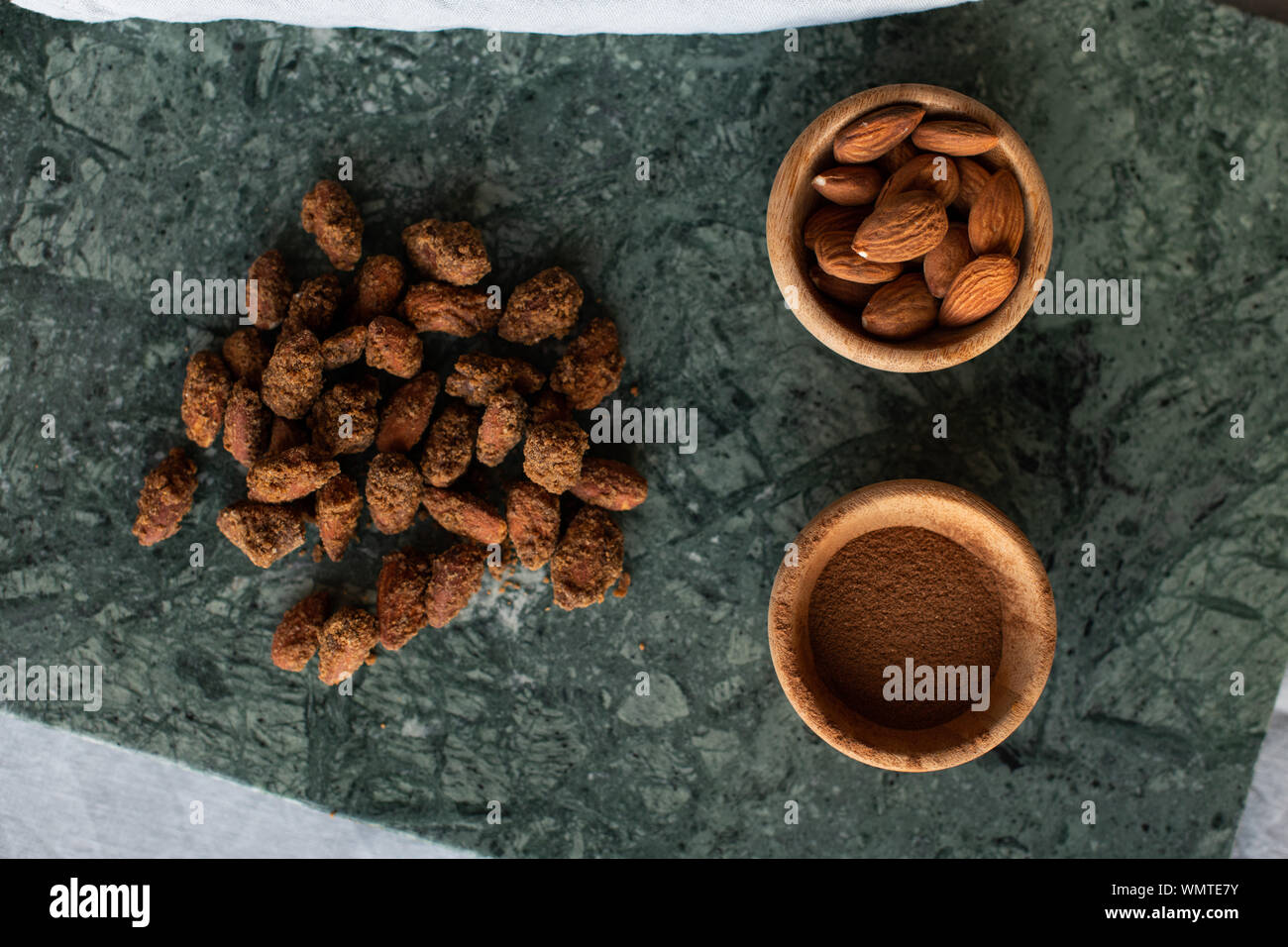 baked garlic with cinnamon, healthy vegan snacks Stock Photo Alamy