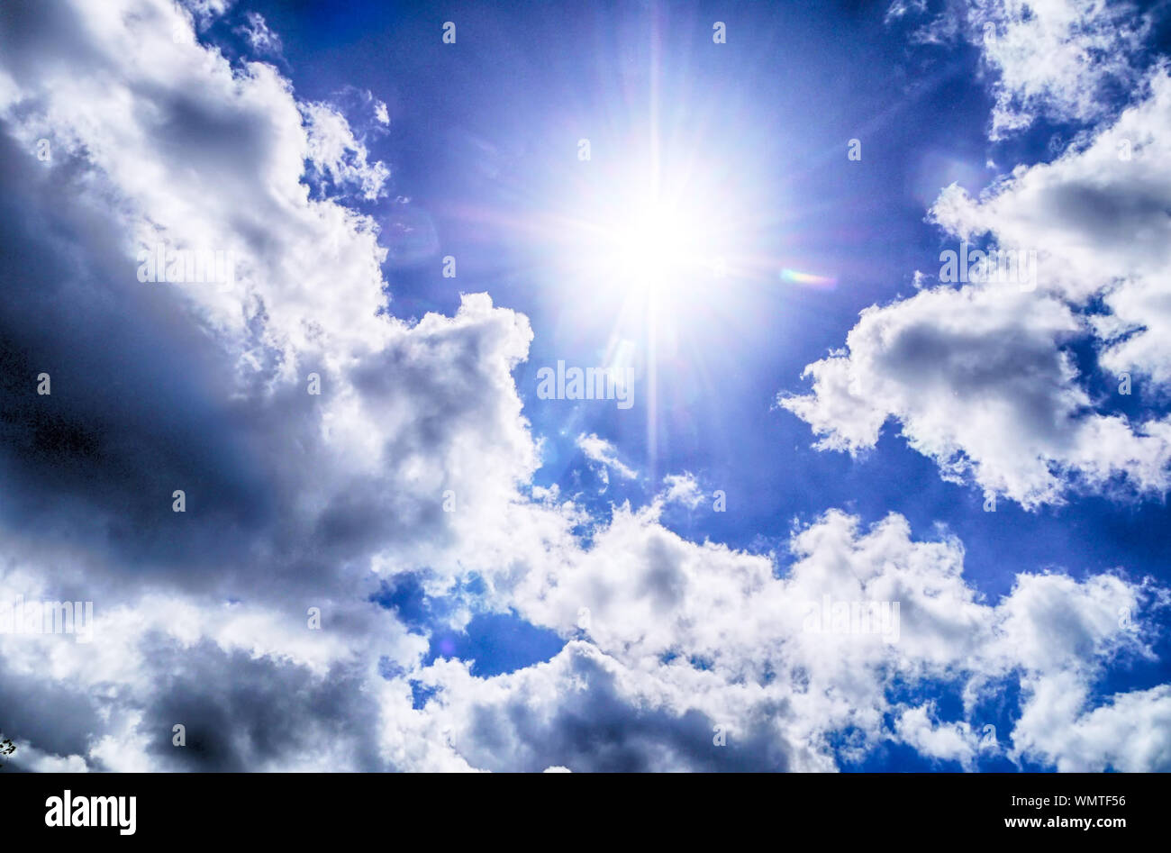 Sun Shining Through Clouds Stock Photo Alamy
