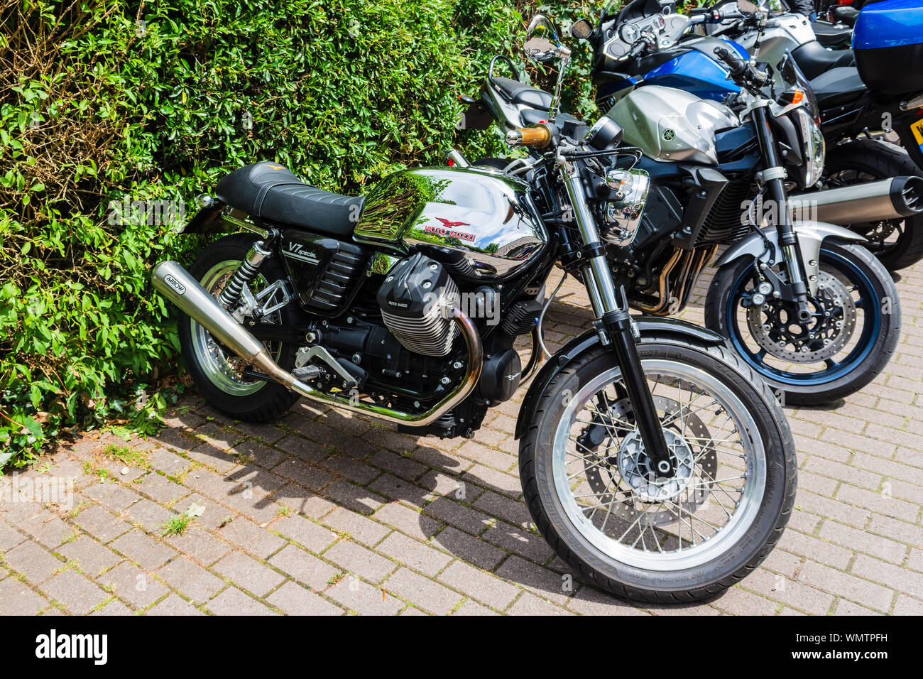 A Moto Guzzi V7 special with a chrome tank parked up at the 2019 Calne Bike meet Stock Photo