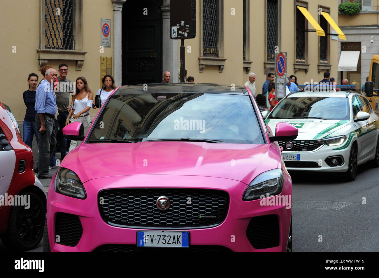 Milan Elettra Lamborghini Shopping In The Center With The Tow Truck Elettra Lamborghini Arrives In The City Center And After Parking Its Brand New Fuchsia Colored Car The Via Montenapoleone Boutique Enters From