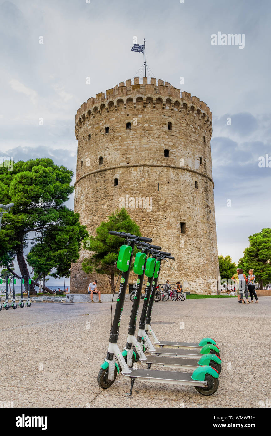 Thessaloniki, Greece parked Lime electric Scooter rentals without  passenger. Green & black ride sharing Lime-S electric scooters before White  Tower Stock Photo - Alamy