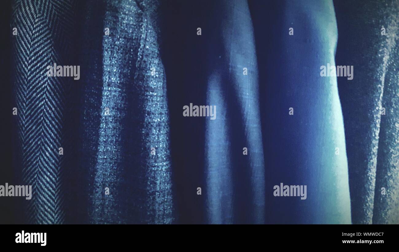 Hanging up coats hi-res stock photography and images - Alamy