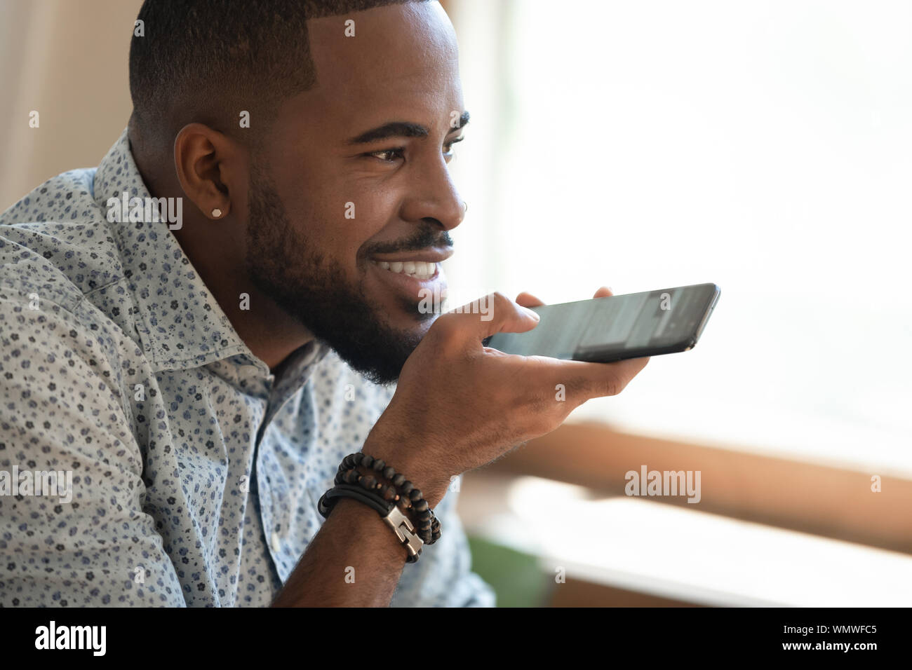 Close Up Happy Black Man Dictating Voice Message Stock Photo Alamy