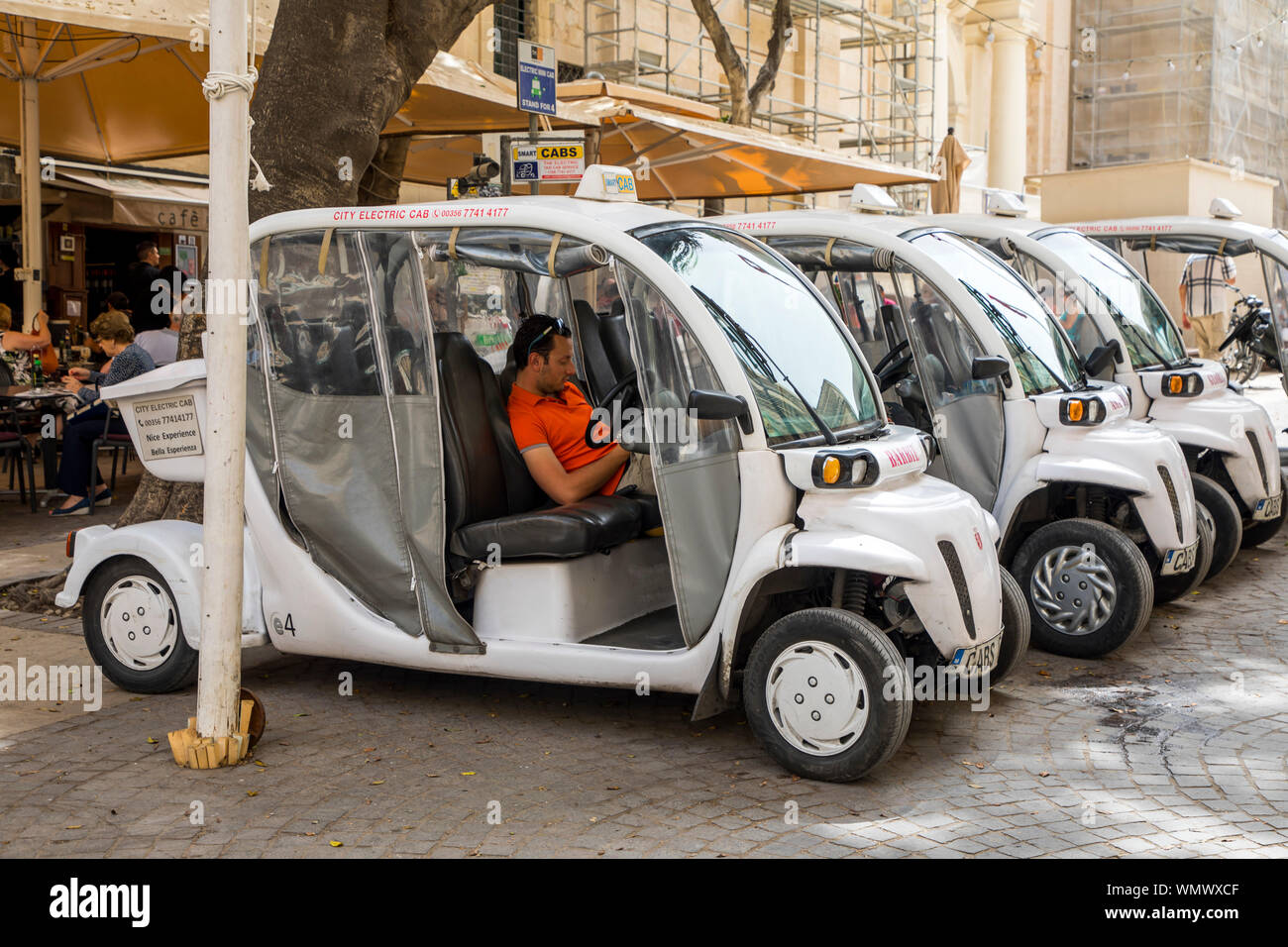 Malta, Valetta, electric taxis in the Old Town, City Electric Cab Stock