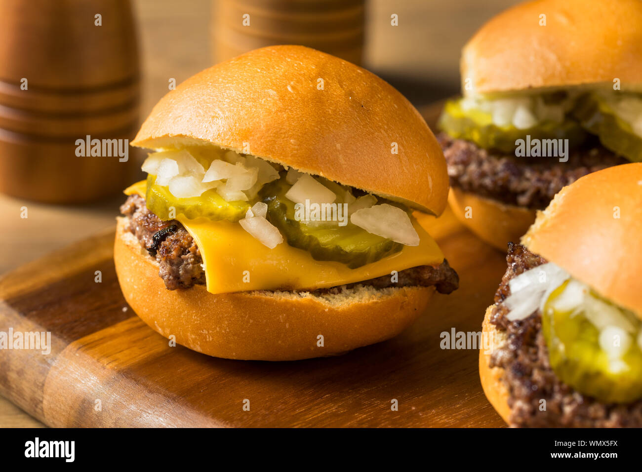 Homemade Beef Cheeseburger Sliders with Onion and Tomato Stock Photo