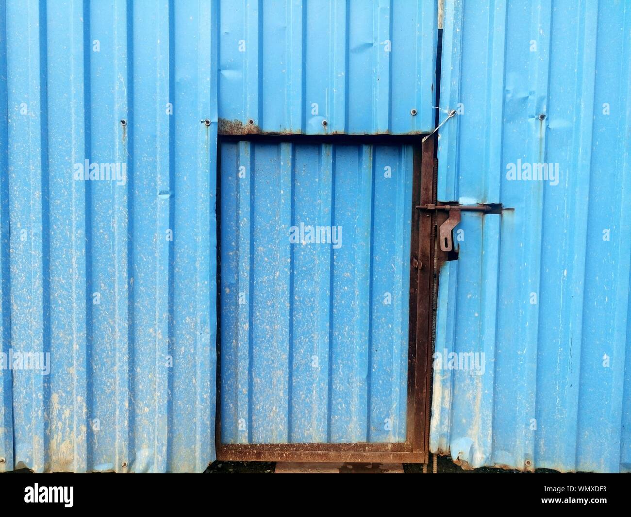 Corrugated Iron Door At Construction Site Stock Photo