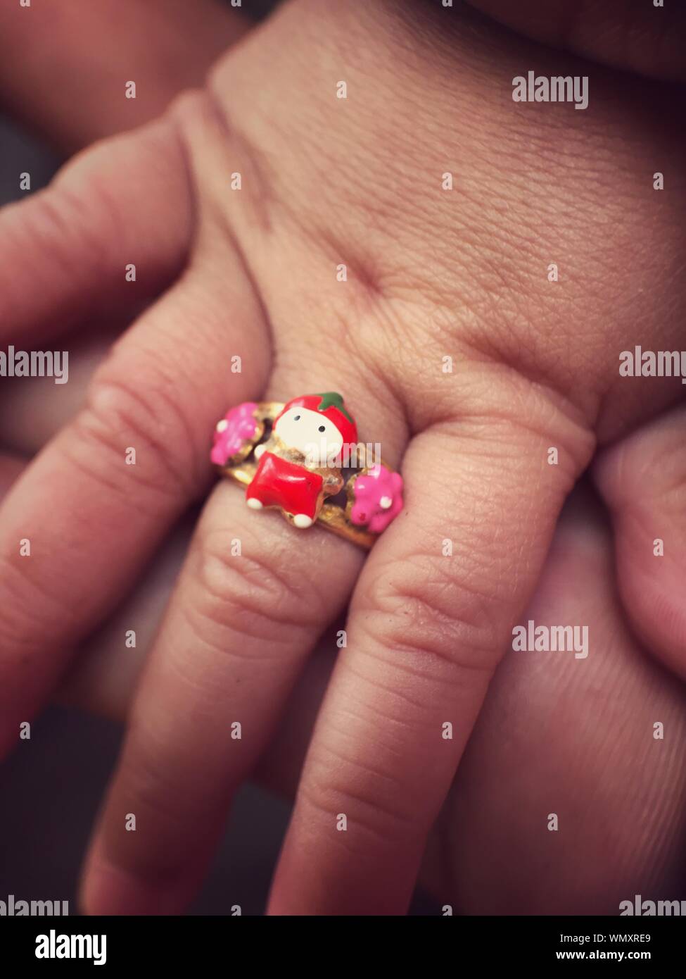 baby wearing rings