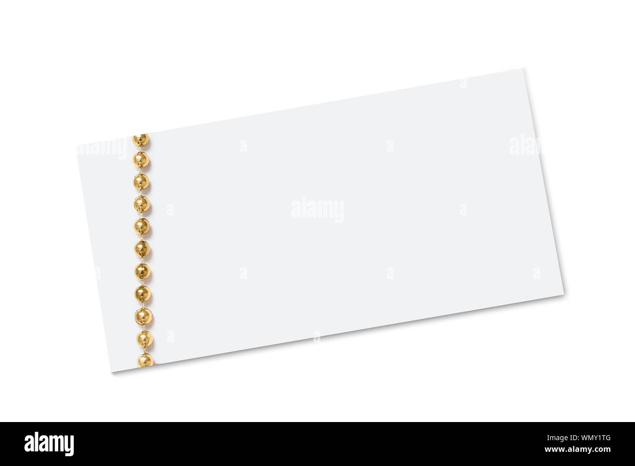 White blank postcard and golden christmas beads. White isolate. Stock Photo