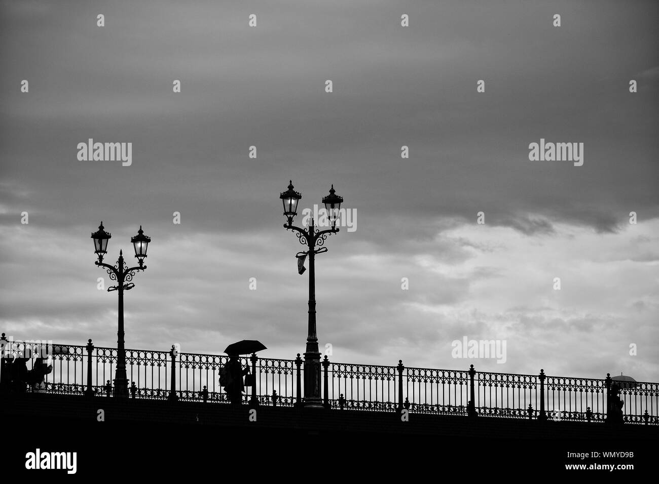Silhouette People Walking On Bridge Stock Photo - Alamy