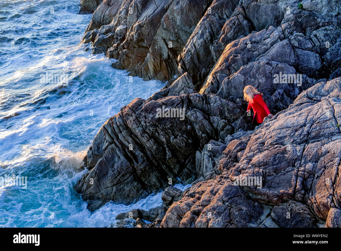 Woman watching waves hi-res stock photography and images - Alamy