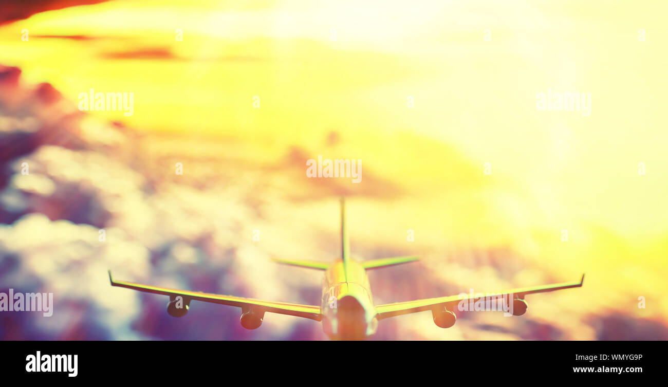 The plane flies in the sky above the clouds Stock Photo - Alamy