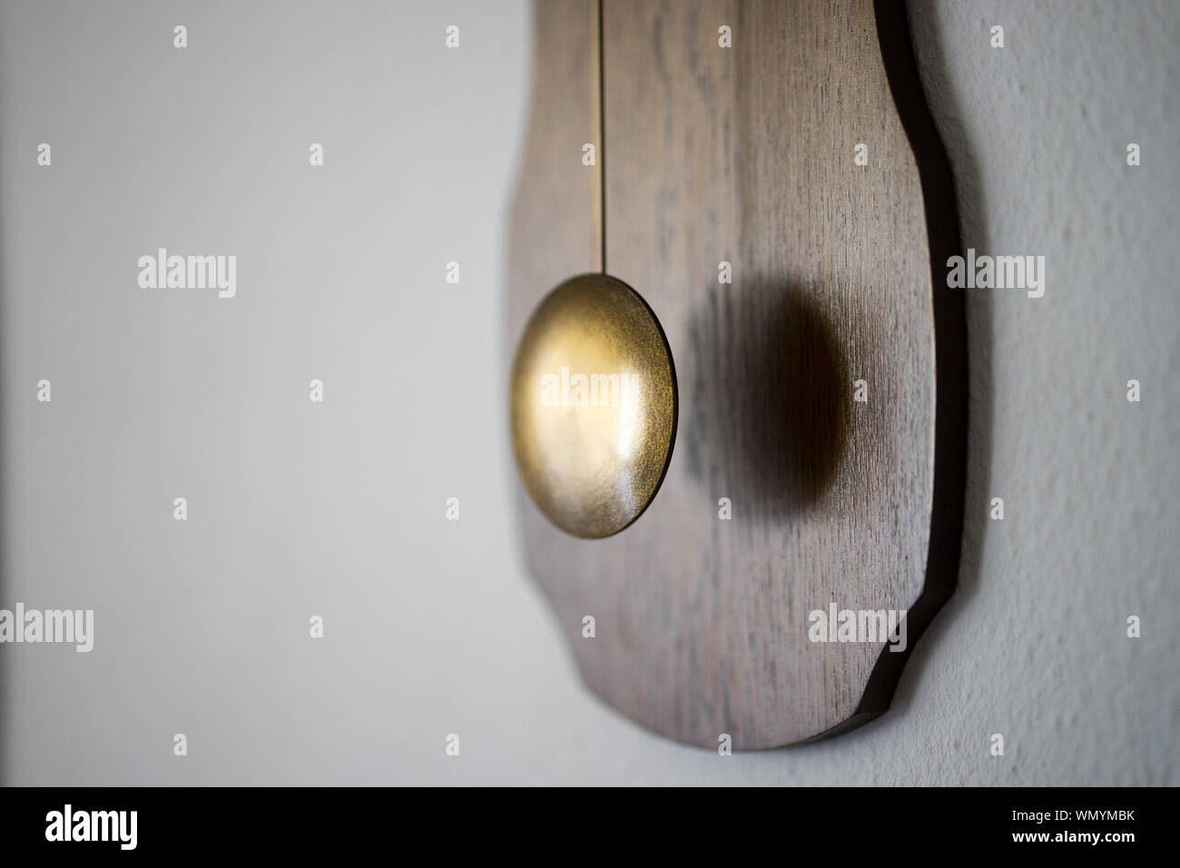 Antique pendulum wall clock hi-res stock photography and images - Alamy