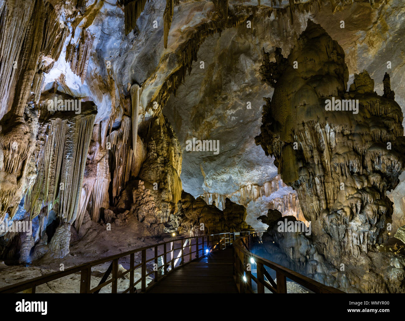 Walking trail through illuminated Paradise Cave, one of the biggest dry caves in the world, in Phong Nha Ke Bang national park, Vietnam, Asia Stock Photo