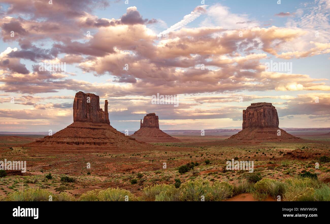 Sunset, Table Mountains West Mid Butte, East Mid Butte, Merrick Butte, Monument Valley, Navajo Tribal Park, Navajo Nation Reservation, Arizona, Utah Stock Photo