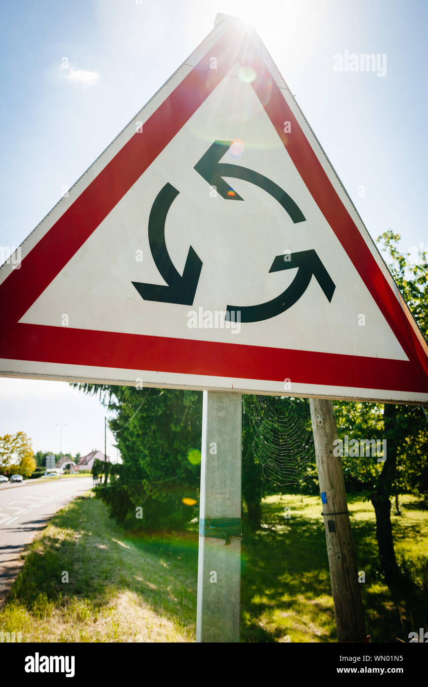 French road and new Roundabout sign indicating that a roundabout is