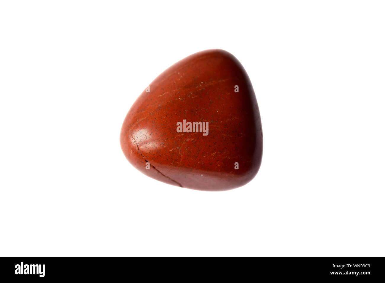 Macro shooting of red Coral mineral or Jasper stone isolated on a white background. Stock Photo