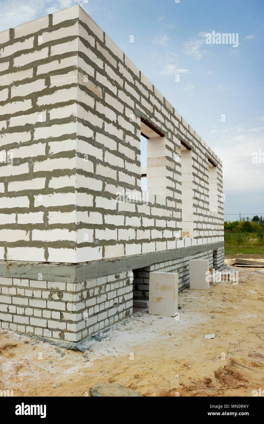 Construction of house from foam concrete blocks on bought site. Beginning  of building Stock Photo - Alamy