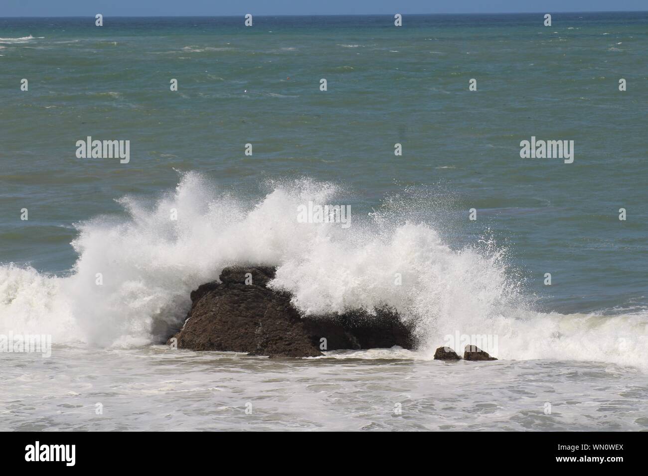 Raging waves hit rocky shore hi-res stock photography and images - Alamy