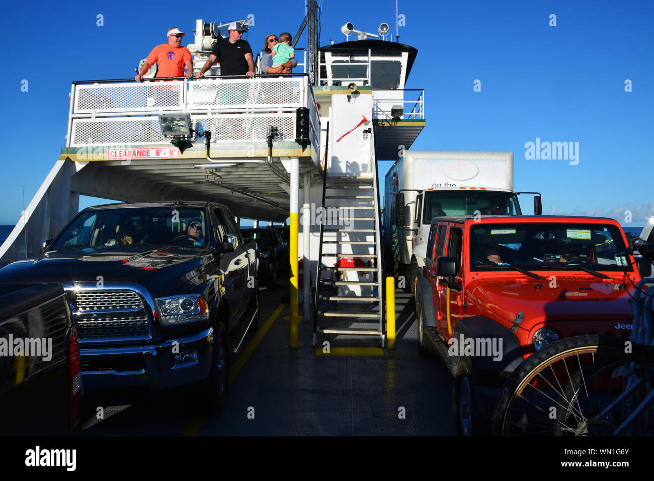 Cars parked on the deck of the Car Ferry Croatian as vacationers make