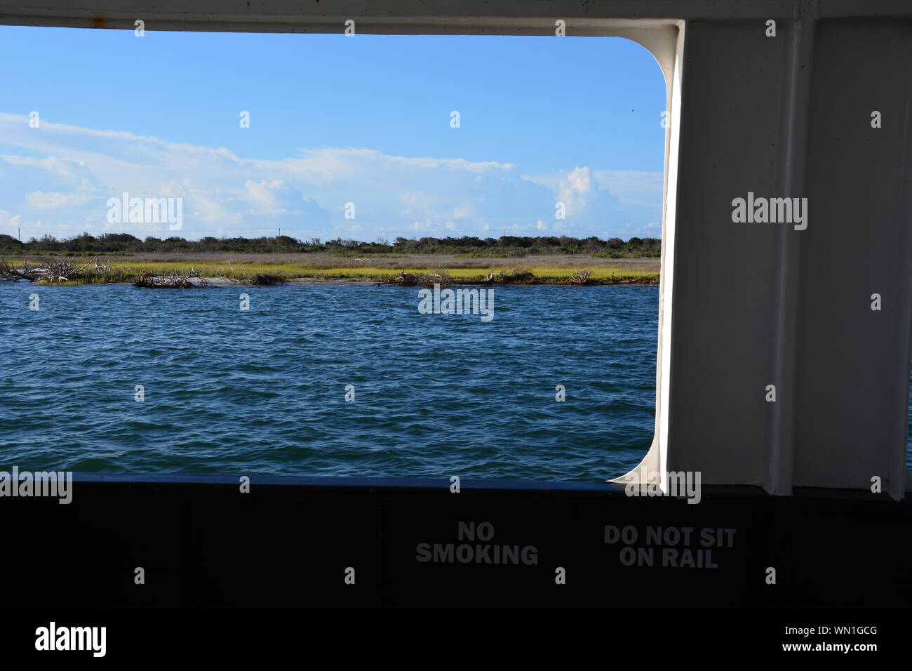 Hatteras Island passes by outside the window of the HatterasOcracoke