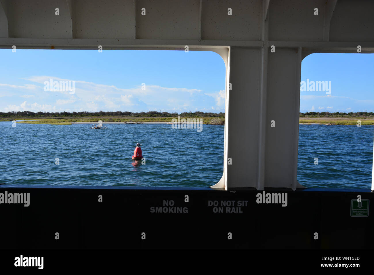 Hatteras Island passes by outside the window of the HatterasOcracoke