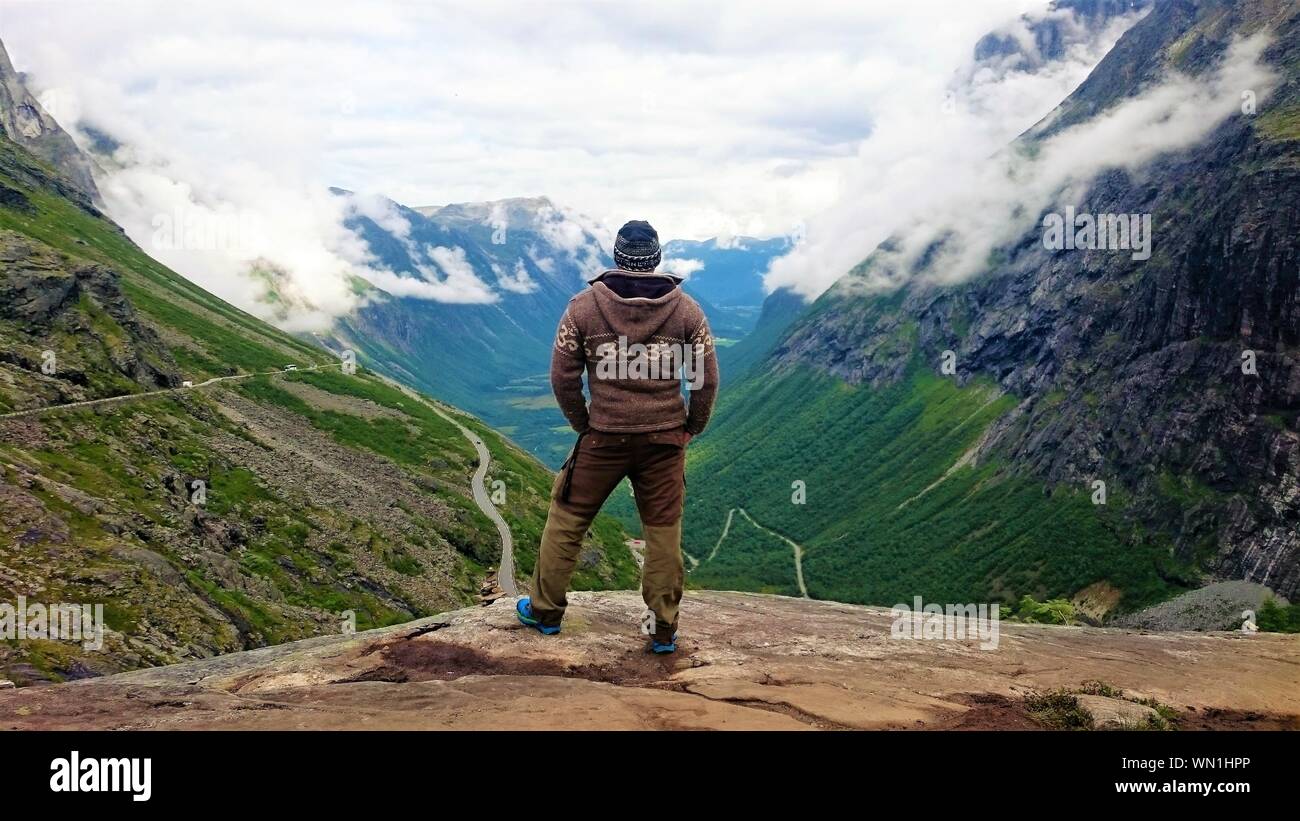 Man walking on winding road hi-res stock photography and images - Alamy