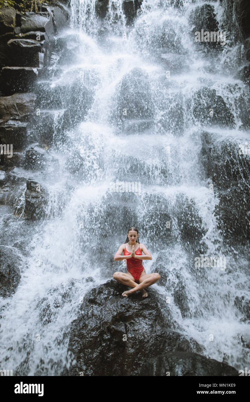 Young woman wearing red swimsuit hi-res stock photography and images ...
